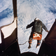 An automatic camera captures Capt. (later Col.) Joseph Kittinger just as he stepped from the balloon-supported Excelsior gondola on August, 16, 1960, at an altitude of 102,800 feet (31,300 m).